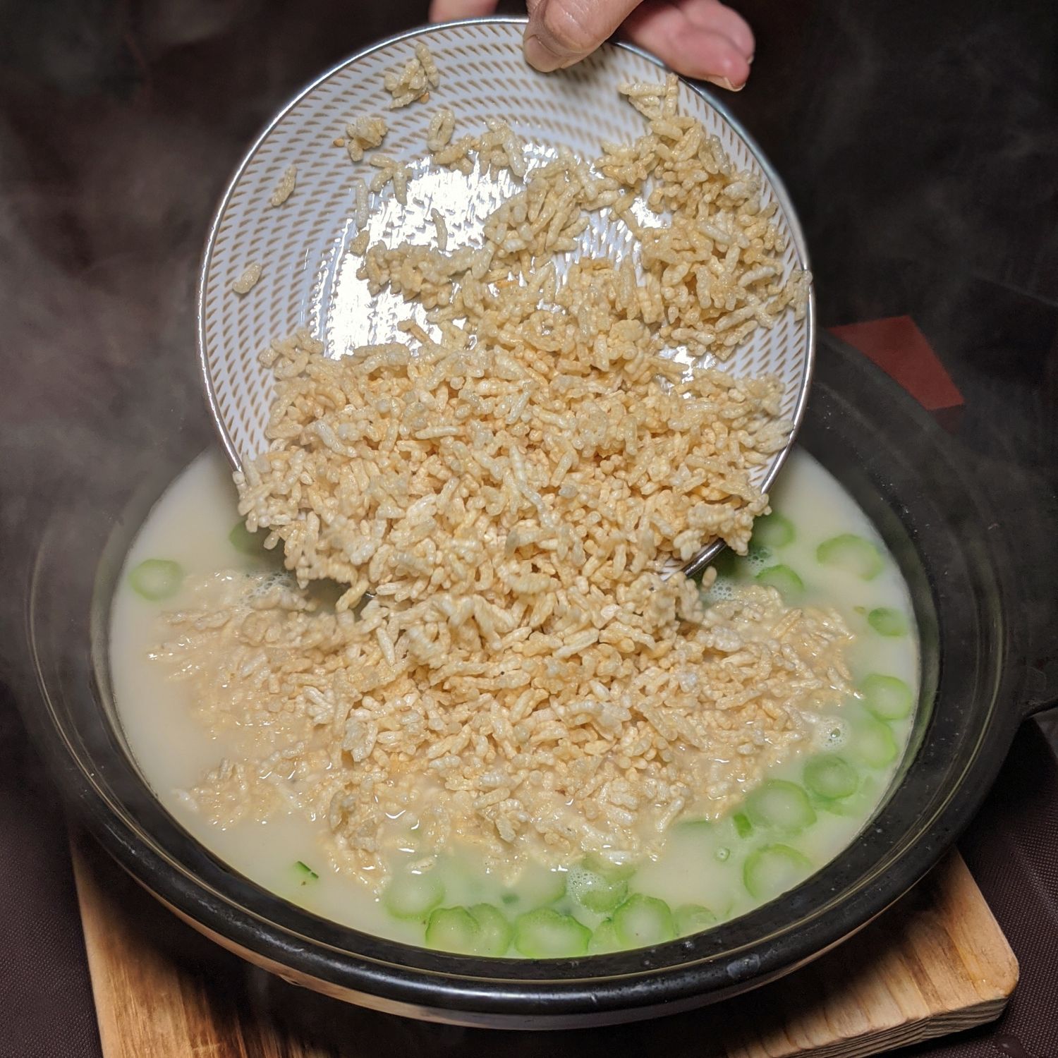 mott 32 singapore Scallops, Prawns, Crispy Rice in Fish Soup
