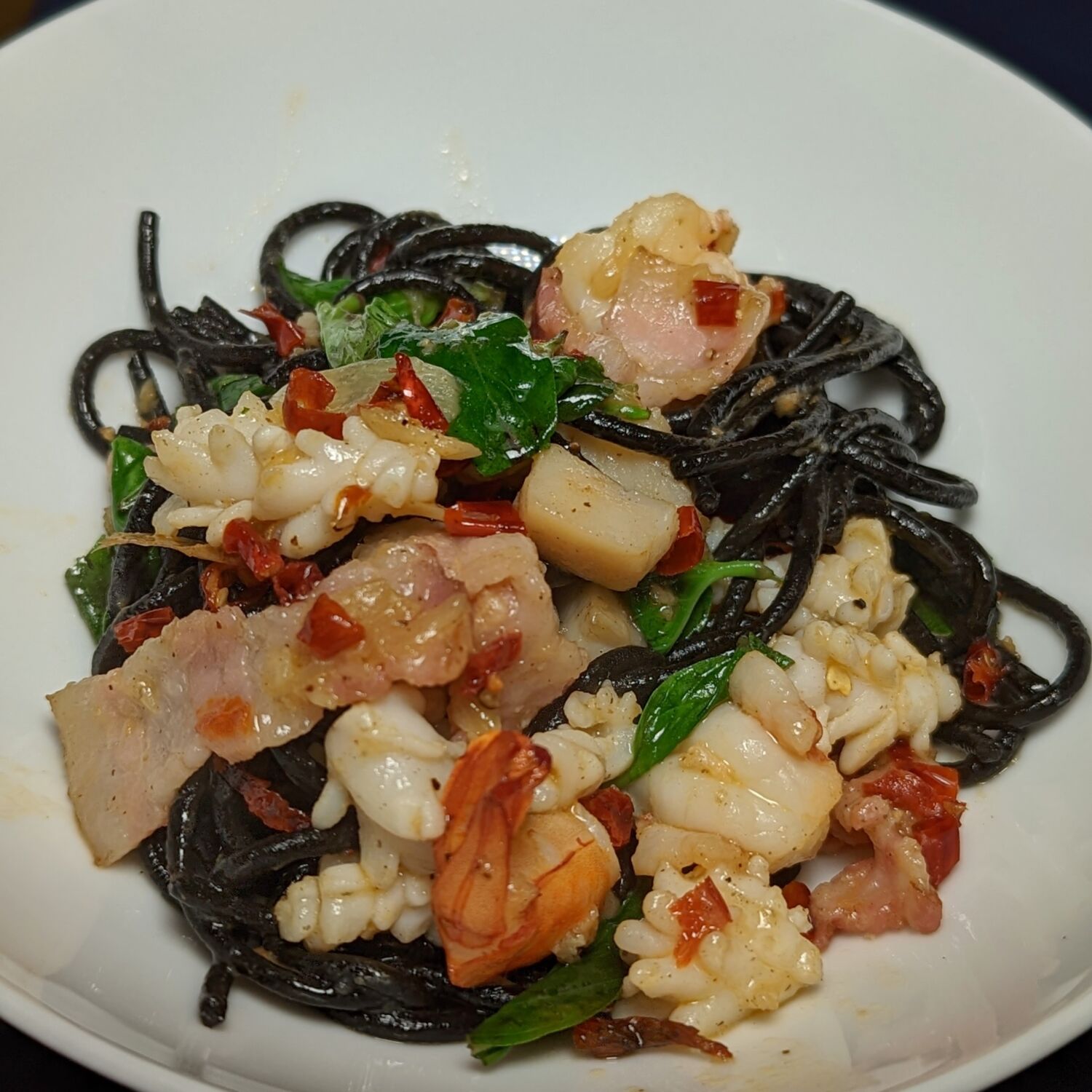 Mandarin Oriental Bangkok Lord Jim's Squid Ink Aglio Olio with Seafood and Bacon