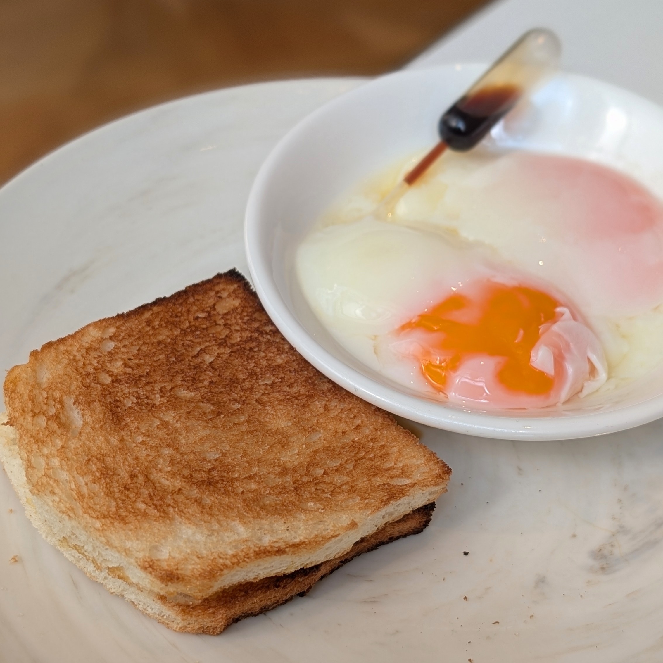 The St. Regis Singapore Sophia Breakfast Soft Boiled Eggs and Kaya Toast