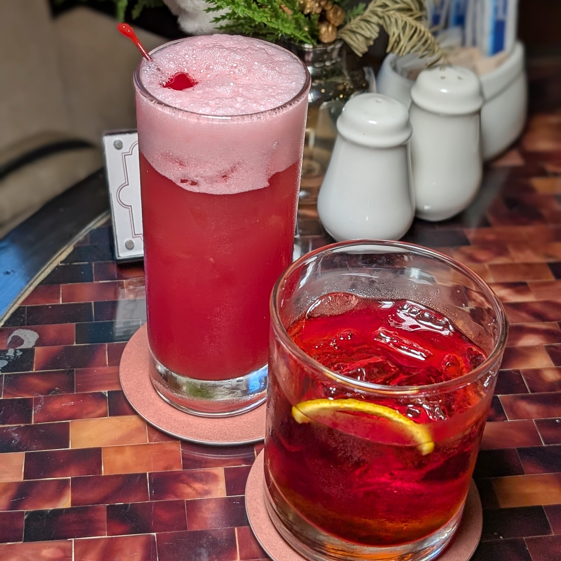 The Fullerton Hotel Singapore The Straits Club Evening Cocktails Singapore Sling and Negroni